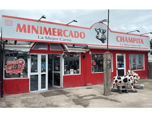Fachada del Minimercado Champita con letrero rojo y blanco, Ushuaia